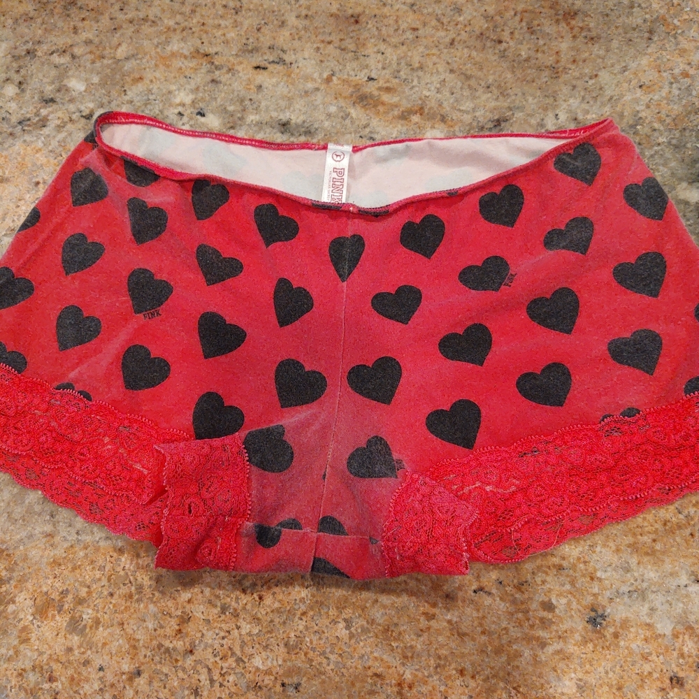 Pink boyshort with lace detail.